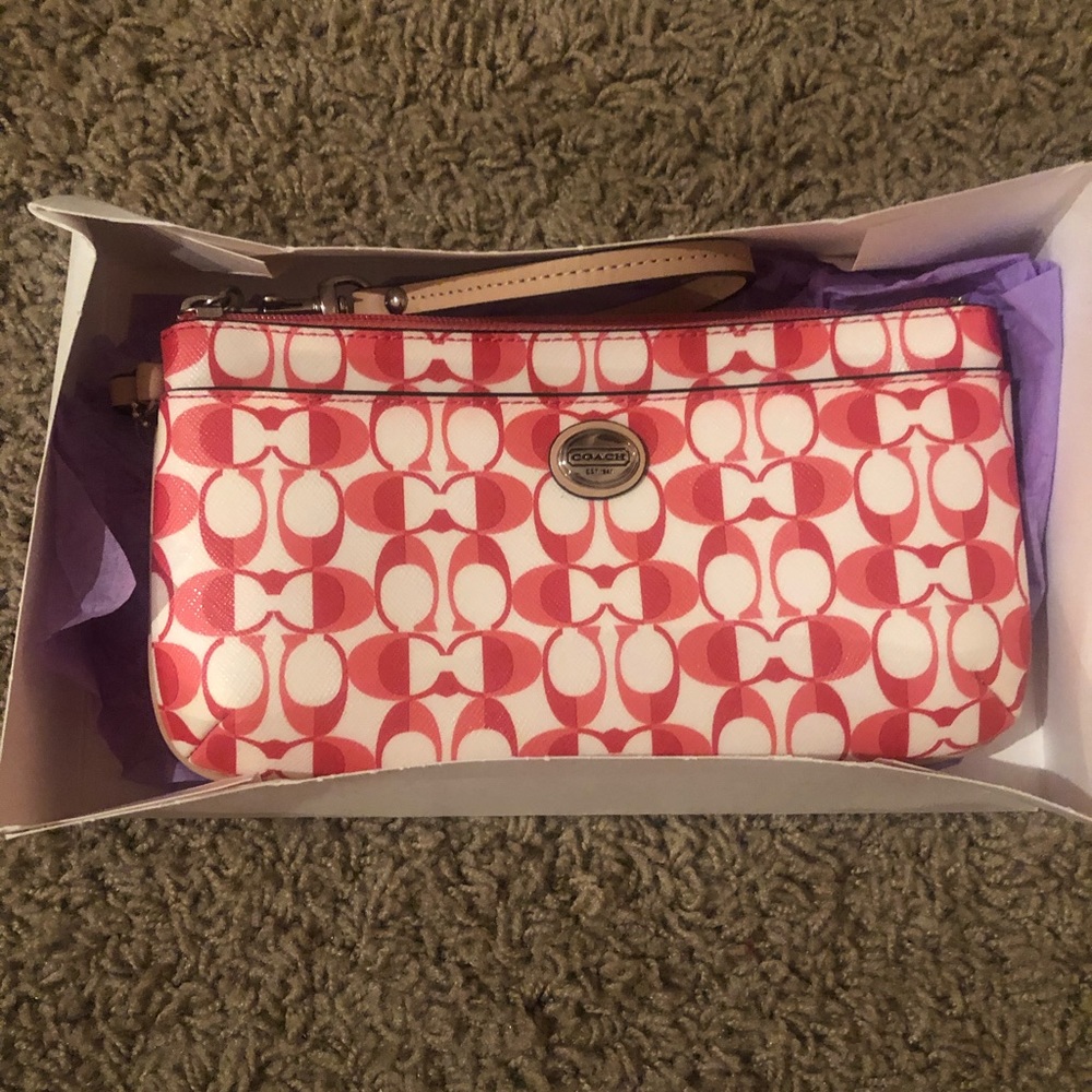 Coach pink wristlet purse or wallet, NWT & box